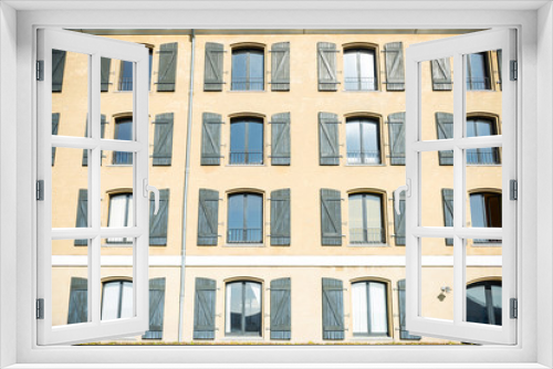 Fototapeta Naklejka Na Ścianę Okno 3D - full frame view of beautiful house with windows and open wooden shutters in copenhagen, denmark