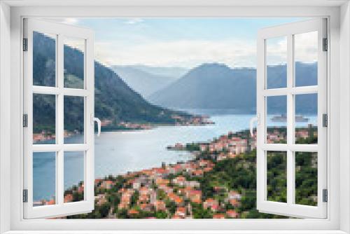 Fototapeta Naklejka Na Ścianę Okno 3D - View from above on the old city Kotor, bay in Adriatic sea and mountains in Montenegro at sunset time, gorgeous nature landscape