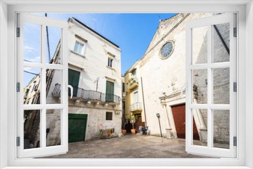 Fototapeta Naklejka Na Ścianę Okno 3D - Small square with a traditional building and a small church in Bari old town (called in Italian 