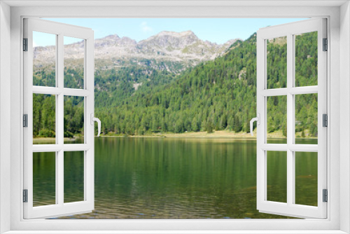 Fototapeta Naklejka Na Ścianę Okno 3D - Little mountain lake with panorama on dolomites  - Madonna di Campiglio -  Trentino Alto Adige