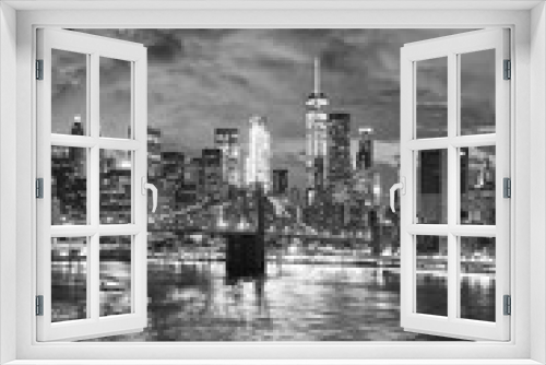 Fototapeta Naklejka Na Ścianę Okno 3D - Black and white picture of New York cityscape at night, USA.
