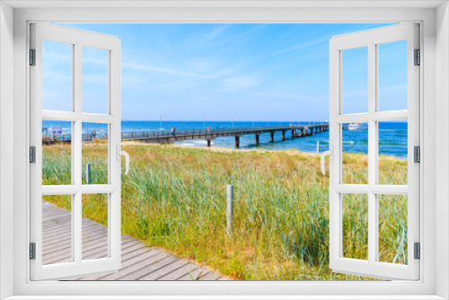 Fototapeta Naklejka Na Ścianę Okno 3D - Pier in Goehren summer resort, view from sand dune, Ruegen island, Baltic Sea, Germany