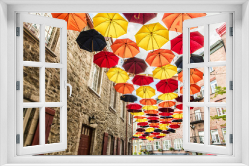 Fototapeta Naklejka Na Ścianę Okno 3D - Lot of Umbrellas in Petit Champlain street Quebec city, Canada
