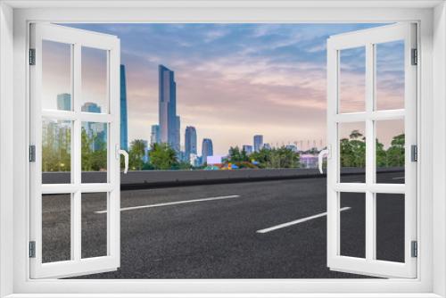 Fototapeta Naklejka Na Ścianę Okno 3D - Prospects for expressway, asphalt pavement, city building commercial building, office building