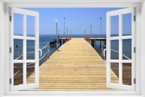 Fototapeta Naklejka Na Ścianę Okno 3D - Wooden pier and sea.