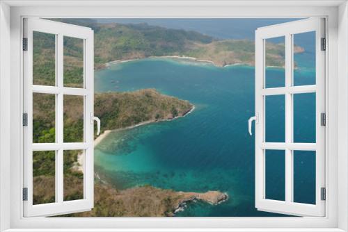 Fototapeta Naklejka Na Ścianę Okno 3D - Aerial view of seashore with beach, lagoons and coral reefs. Philippines, Luzon. Coast ocean with tropical beach, turquoise water. Tropical landscape in Asia.