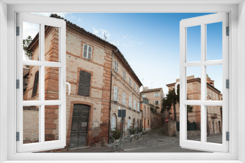 Fototapeta Naklejka Na Ścianę Okno 3D - Street view of Fermo with old living houses