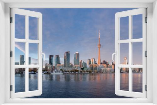 Fototapeta Naklejka Na Ścianę Okno 3D - Toronto cityscape from the islands at dusk.