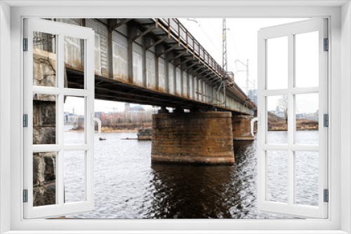 Fototapeta Naklejka Na Ścianę Okno 3D - View to the Bridge at the spring cloudy day