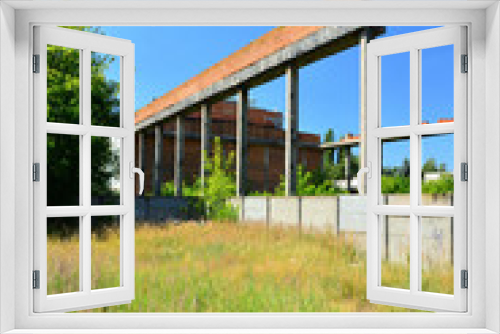 Fototapeta Naklejka Na Ścianę Okno 3D - Element konstrukcyjny hali w budowie.