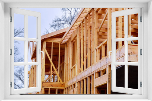 Fototapeta Naklejka Na Ścianę Okno 3D - Abstract of Wood Home Framing at Construction Site.