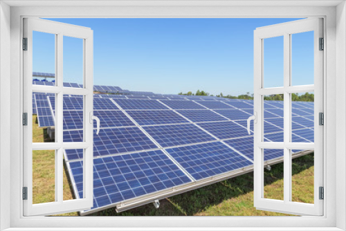 Fototapeta Naklejka Na Ścianę Okno 3D - Close up rows array of polycrystalline silicon solar cells or photovoltaics in solar power plant turn up skyward absorb the sunlight from the sun 