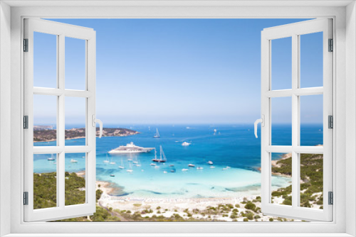 Fototapeta Naklejka Na Ścianę Okno 3D - Aerial view of an emerald and transparent mediterranean sea with a white beach and some yachts. Gulf of the Great Pevero, Costa Smeralda, Sardinia, Italy.