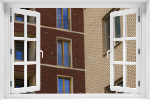 Fototapeta Naklejka Na Ścianę Okno 3D - Two brick houses. large Windows.