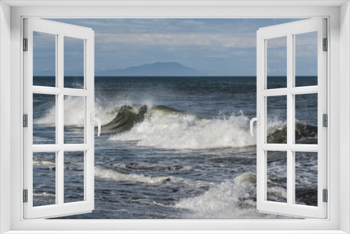 Fototapeta Naklejka Na Ścianę Okno 3D - A view of a scenic blue ocean wave