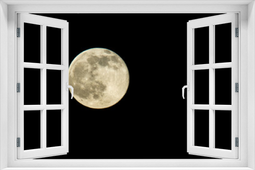 Fototapeta Naklejka Na Ścianę Okno 3D - A full moon hangs in the sky