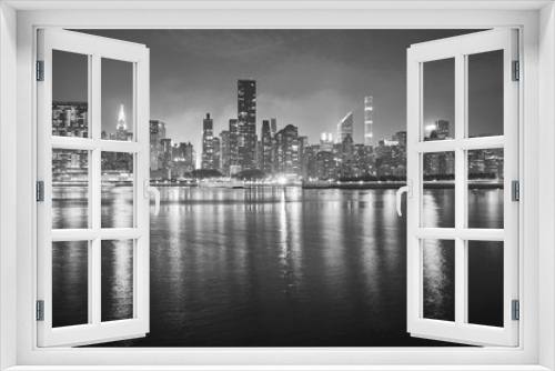 Fototapeta Naklejka Na Ścianę Okno 3D - Black and white picture of Manhattan at night, New York City, USA.