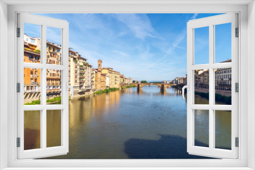 Fototapeta Naklejka Na Ścianę Okno 3D - Colorful old buildings line the Arno River in Florence, Italy