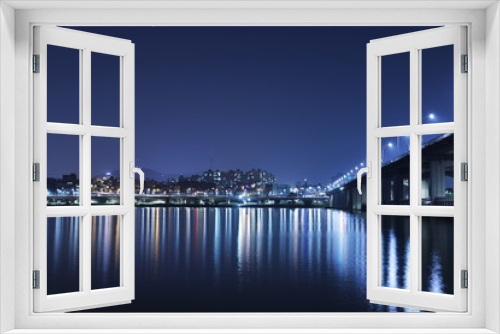 Fototapeta Naklejka Na Ścianę Okno 3D - Banpo Bridge in Seoul, South Korea. Night view of a city with a river.