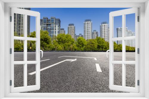 Panoramic skyline and modern business office buildings with empty road,empty concrete square floor