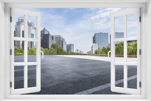 Fototapeta Naklejka Na Ścianę Okno 3D - Panoramic skyline and modern business office buildings with empty road,empty concrete square floor