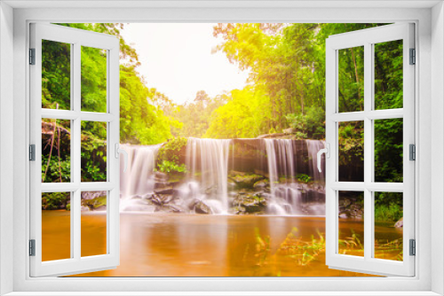 Fototapeta Naklejka Na Ścianę Okno 3D - Amazing of Huay Luang Waterfall, The waterfall is plunging down three steps from an elevation of 30 meters with pool, Phu chong Na Yoi National Park, Ubon Ratchathani, Thailand.