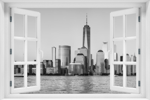 Fototapeta Naklejka Na Ścianę Okno 3D - Black and white picture of Manhattan waterfront at sunset, New York City, USA.
