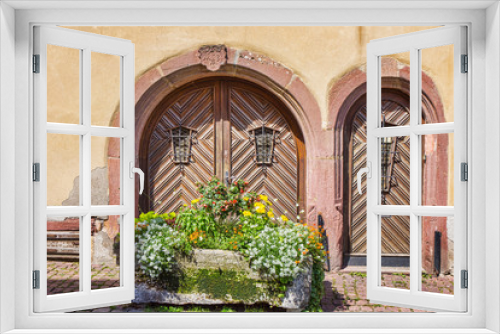 Fototapeta Naklejka Na Ścianę Okno 3D - ..Entrance doors. The ancient city of Aegisheim. Wine Road Alsace. France.