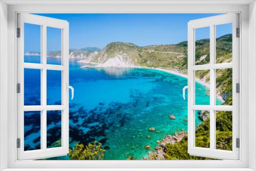 Fototapeta Naklejka Na Ścianę Okno 3D - Myrtos beach with azure blue sea water in the bay. Favorite tourist visiting destination place at summer on Kefalonia island, Greece, Europe