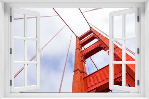 Fototapeta Naklejka Na Ścianę Okno 3D - Golden Gate Bridge on a beautiful sunny day with blue sky and clouds in summer - San Fancisco Bay Area,  Golden Gate National Recreation Area, California, USA