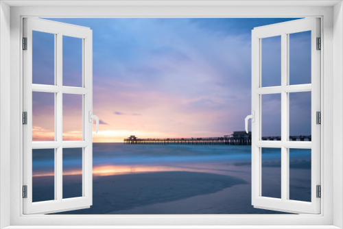 Fototapeta Naklejka Na Ścianę Okno 3D - Iconic Naples Pier the symbol of this famous city in southwest Florida, USA. Amazing and calm ocean during sunset, cloudscape after a big tropical storm in the Gulf of Mexico, close to Everglades Nati