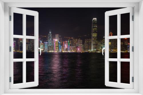 Fototapeta Naklejka Na Ścianę Okno 3D - The amazing Hong Kong skyline light up at night