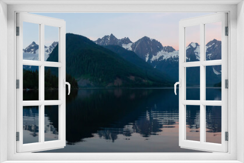 Fototapeta Naklejka Na Ścianę Okno 3D - Panoramic view of Jones Lake during a vibrant summer sunrise. Located between Hope and Chilliwack, East of Vancouver, BC, Canada.