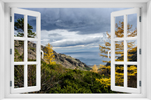 Fototapeta Naklejka Na Ścianę Okno 3D - Sunny day at the mountains with colorfull clouds