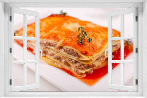 Fototapeta Naklejka Na Ścianę Okno 3D - Italian Food. Hot tasty Classic Lasagna with bolognese sauce on white plate.