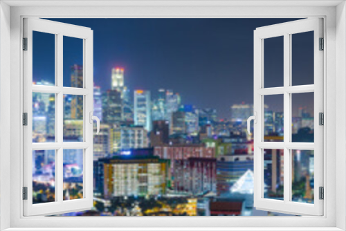 Fototapeta Naklejka Na Ścianę Okno 3D - Panorama of downtown Singapore with Business district and Flyer wheel, at night