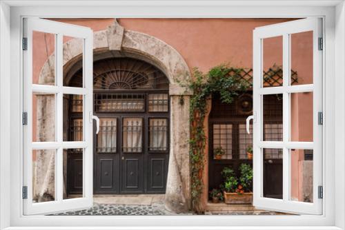 Fototapeta Naklejka Na Ścianę Okno 3D - Beautiful doorway in the old district of Trastevere in Rome