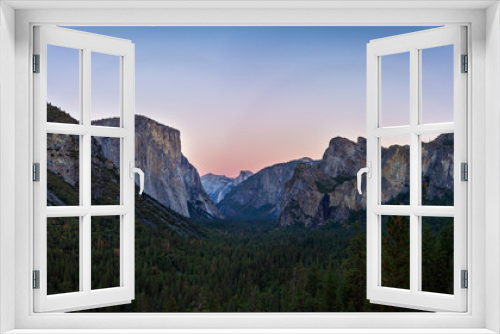 Fototapeta Naklejka Na Ścianę Okno 3D - Yosemite valley nation park during sunset view from tunnel view on twilight time. Yosemite nation park, California, USA. Panoramic image.