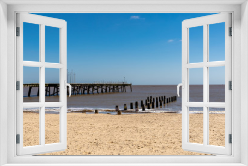 Fototapeta Naklejka Na Ścianę Okno 3D - North Sea coast in Kirkley, Lowestoft, Suffolk, England, UK with the Claremont Pier and a wave breaker