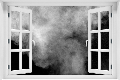 Fototapeta Naklejka Na Ścianę Okno 3D - Bizarre forms of white powder explosion cloud against black background.