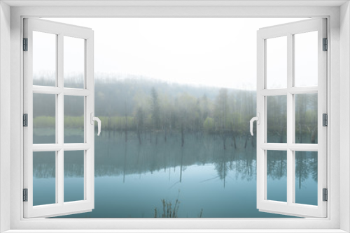 Fototapeta Naklejka Na Ścianę Okno 3D - 爽やかな青い池のイメージ / 北海道美瑛町の観光イメージ
