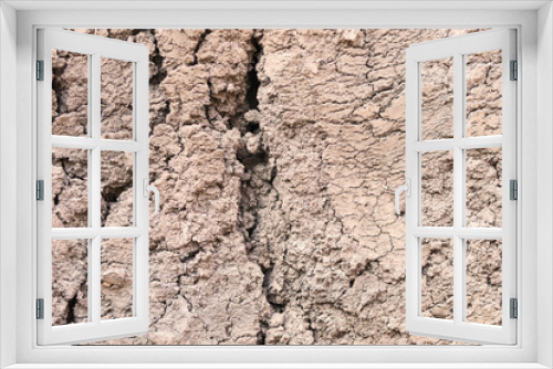 Fototapeta Naklejka Na Ścianę Okno 3D - Abstract texture of brown dry ground with cracks and fractures