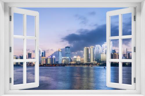 Fototapeta Naklejka Na Ścianę Okno 3D - Night view of Modern Architecture City in Qingdao
