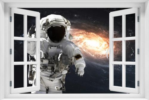 Fototapeta Naklejka Na Ścianę Okno 3D - Astronaut at spacewalk, EVA, awesome science fiction wallpaper. Elements of this image furnished by NASA