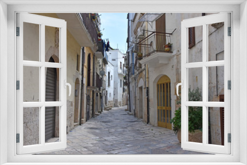 Fototapeta Naklejka Na Ścianę Okno 3D - Italy, Puglia region, Altamura,  view and details of palaces, alleys, churches, doors, windows, balconies and various architecture of the historic center.