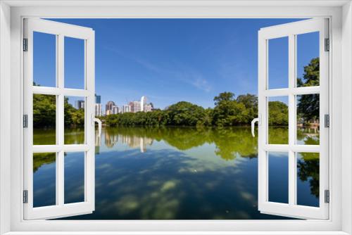 Fototapeta Naklejka Na Ścianę Okno 3D - Reflections of the Atlanta Skyline in Lake Clara Meer