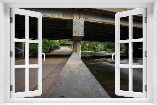 Fototapeta Naklejka Na Ścianę Okno 3D - Underpass along the Boulder Creek 