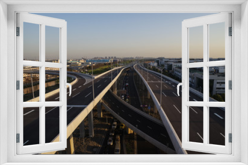 Fototapeta Naklejka Na Ścianę Okno 3D - A Maze of Roads of Overpass in the City