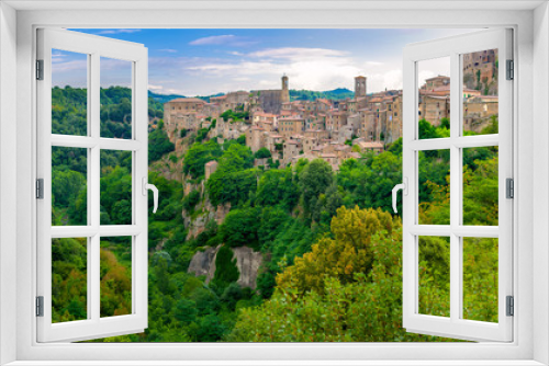 Panorama of the beautiful medieval village of Sorano located on the edge of the cliff, Tuscany. Italy. Europe