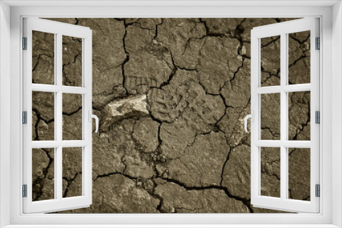 Fototapeta Naklejka Na Ścianę Okno 3D - Dry cracked earth. The desert. Background. It's hot, the global shortage of water on the planet.